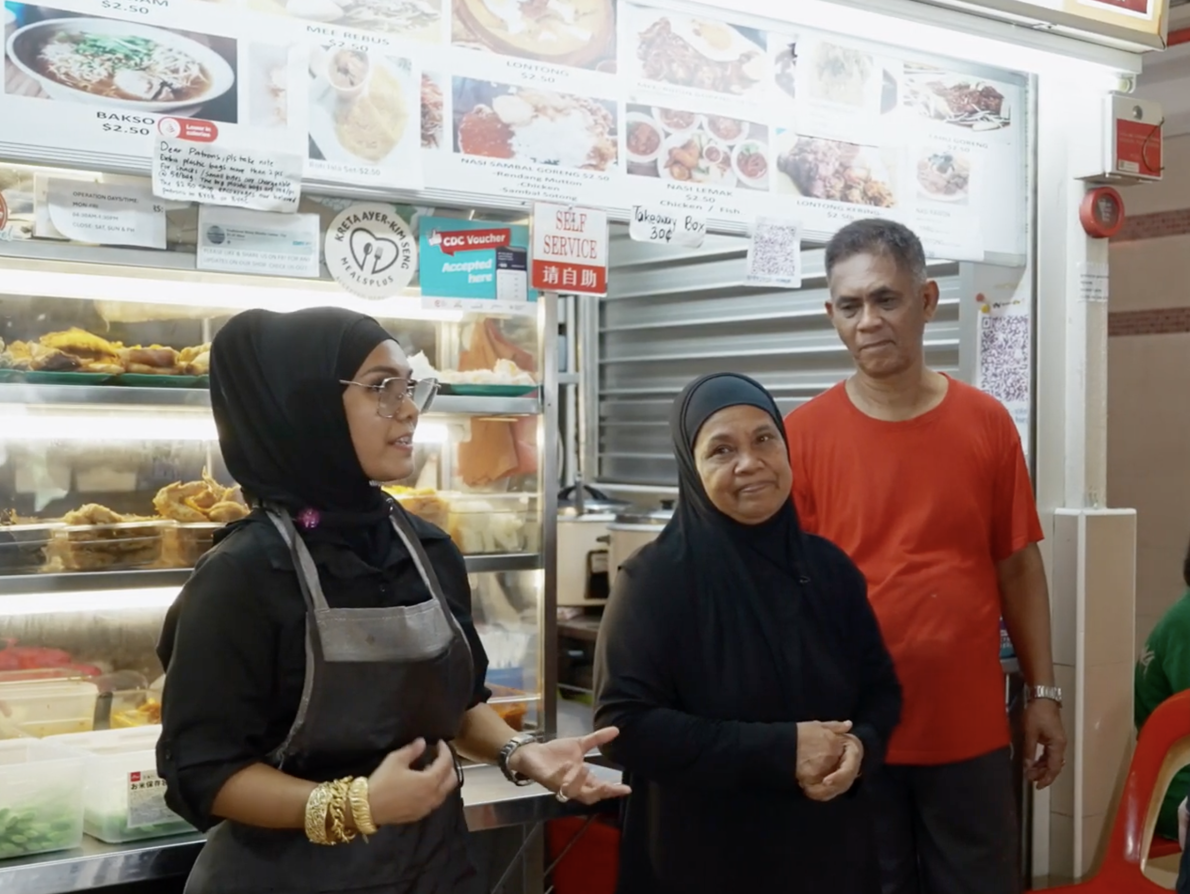 Volunteers serving community meals